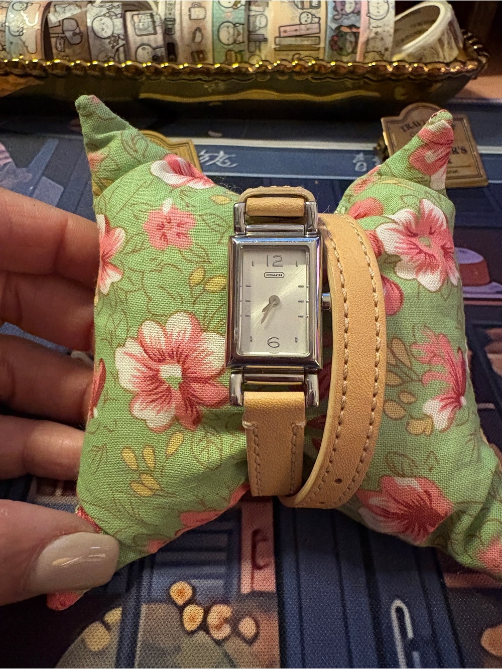 Coach Women's watch with Wrap-Around tan leather Strap.